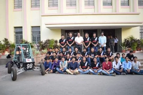 Team Firebolt at the main building of BIT Mesra with their ATV.